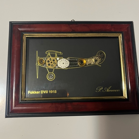 framed piece of art featuring a representation of an airplane with clock pieces - Picture 3 of 10